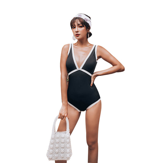 Women's one-piece black and white swimsuit