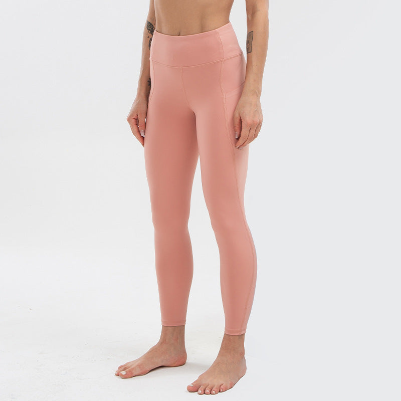 Pantaloni sportivi da yoga a vita alta color carne, senza cuciture, adatti alla pelle