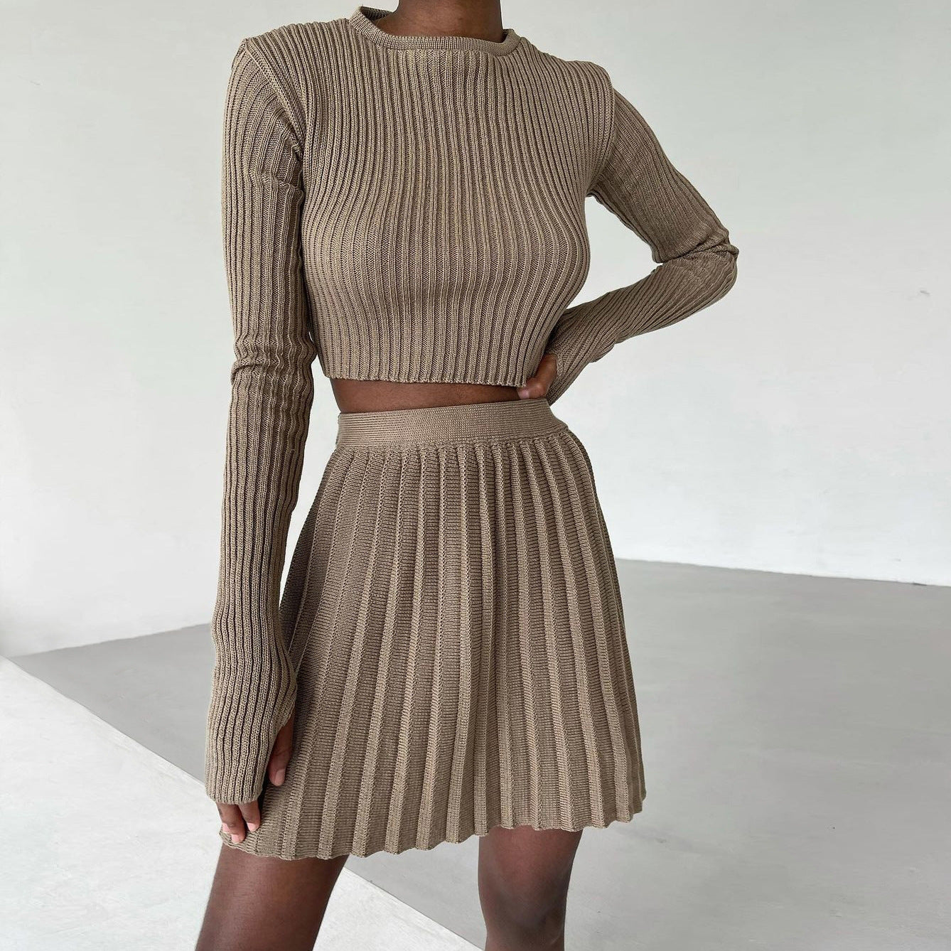 Two-piece Long-sleeved Tight-fitting Pleated Knit Short Skirt Sweater