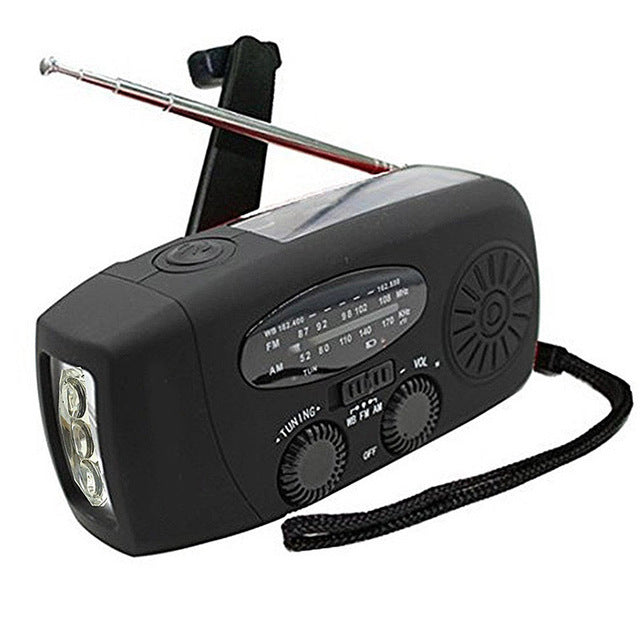 Solar hand crank radio flashlight